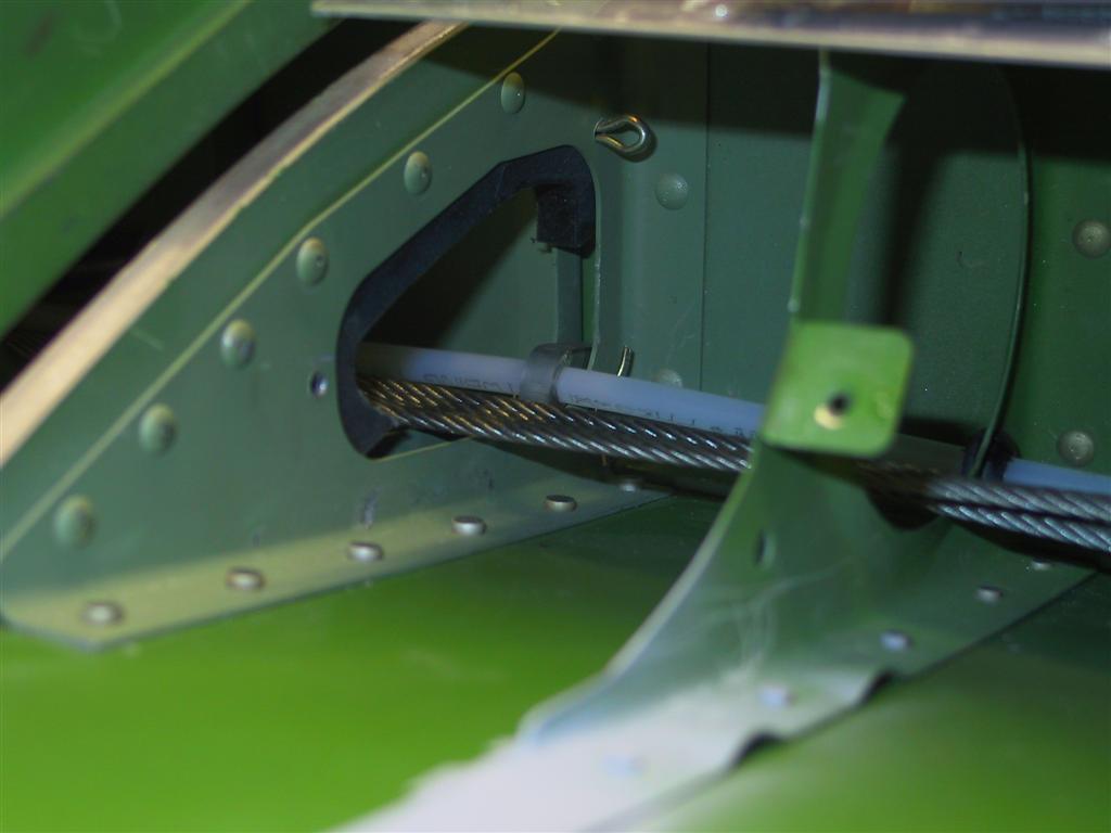 IMG_2124_Fuel_vent_line_and_aileron_cables_passing_through_flap_track_(Large).JPG