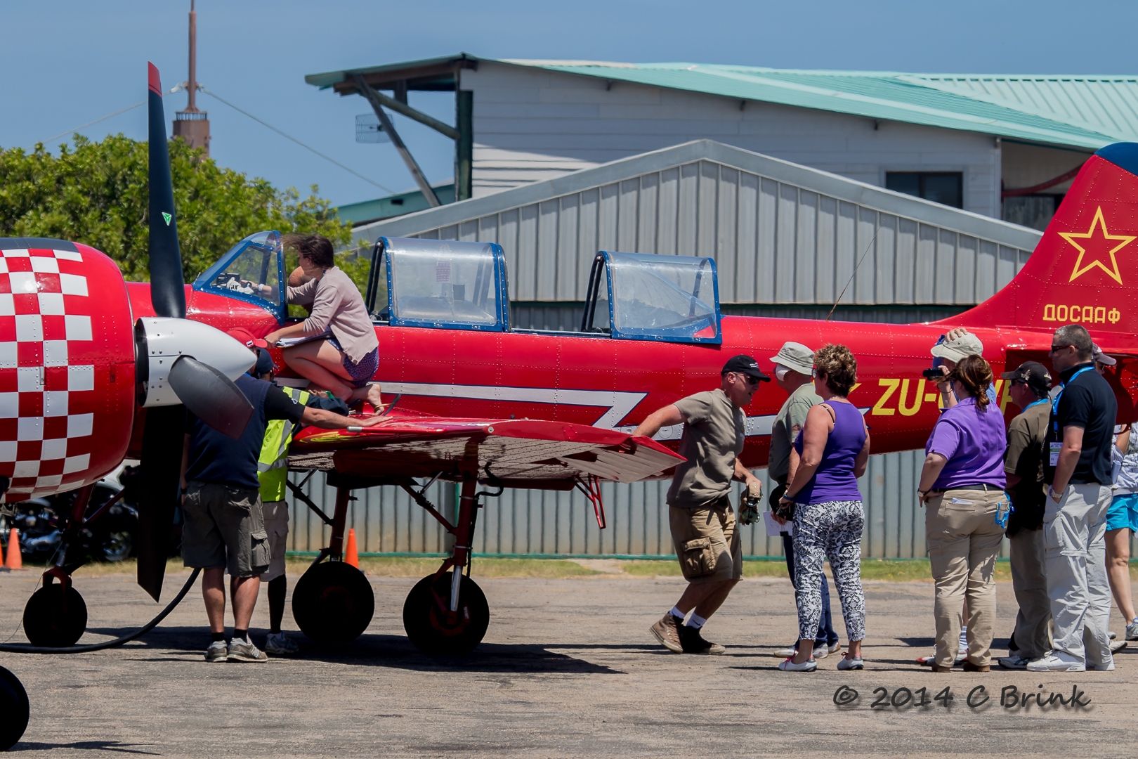 FAI Yak-52 World Aerobatic Championship 2014 - Kelly checking G meter - 7.4 - ZU-CWP - Belgium -.JPG