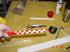 Aileron counter balance rods - checkered 002.jpg